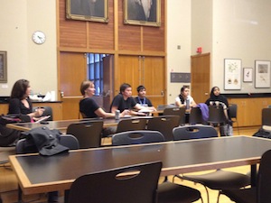 The CSC Bridge students conduct a design review with Kris Morrissey and Jessica Luke of UW Museology in the Burke Classroom.