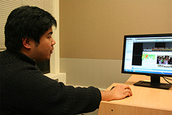 Robert Racadio (HCDE student) works in the LUTE lab.