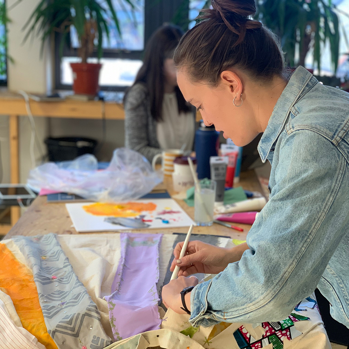 Student working with a textile 