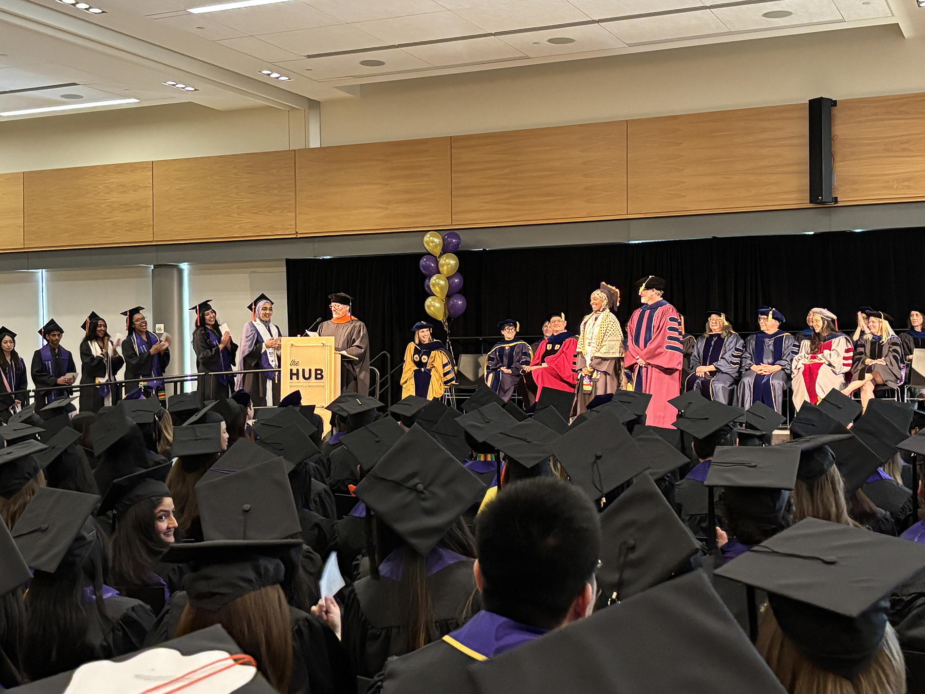 Students cross the stage