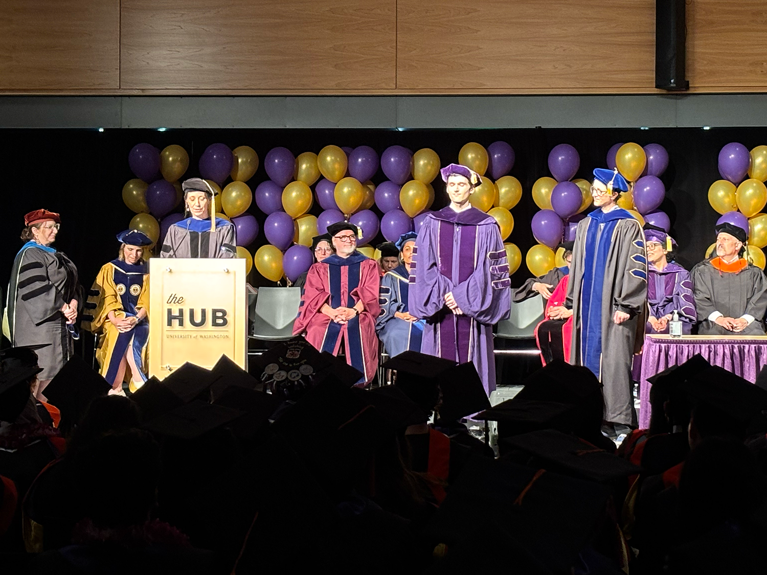 Graduates crossing the stage