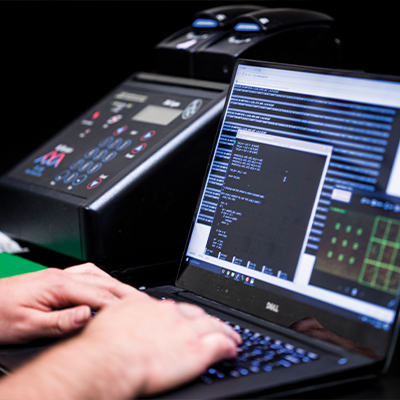 Hands on a laptop keyboard