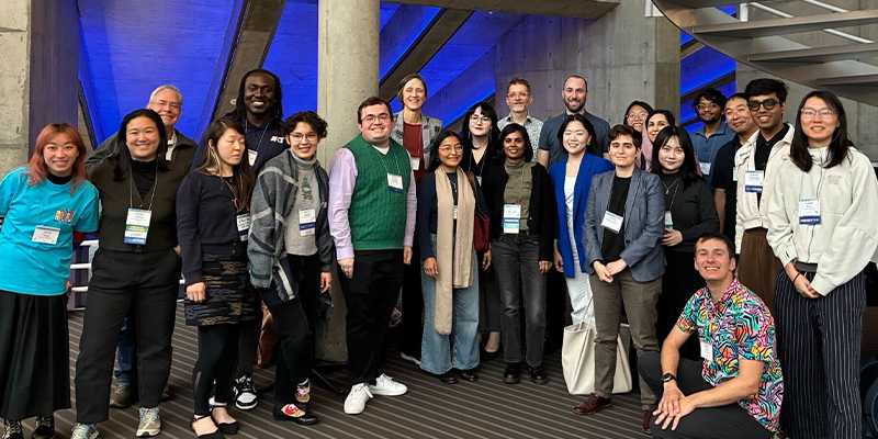 Group photo of about 30 people at CSCW 2025