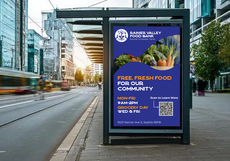 Rainier Valley Food Bank bus shelter advertisement concept promoting free, fresh food for the community, with grocery hours, address and a QR code for more information.