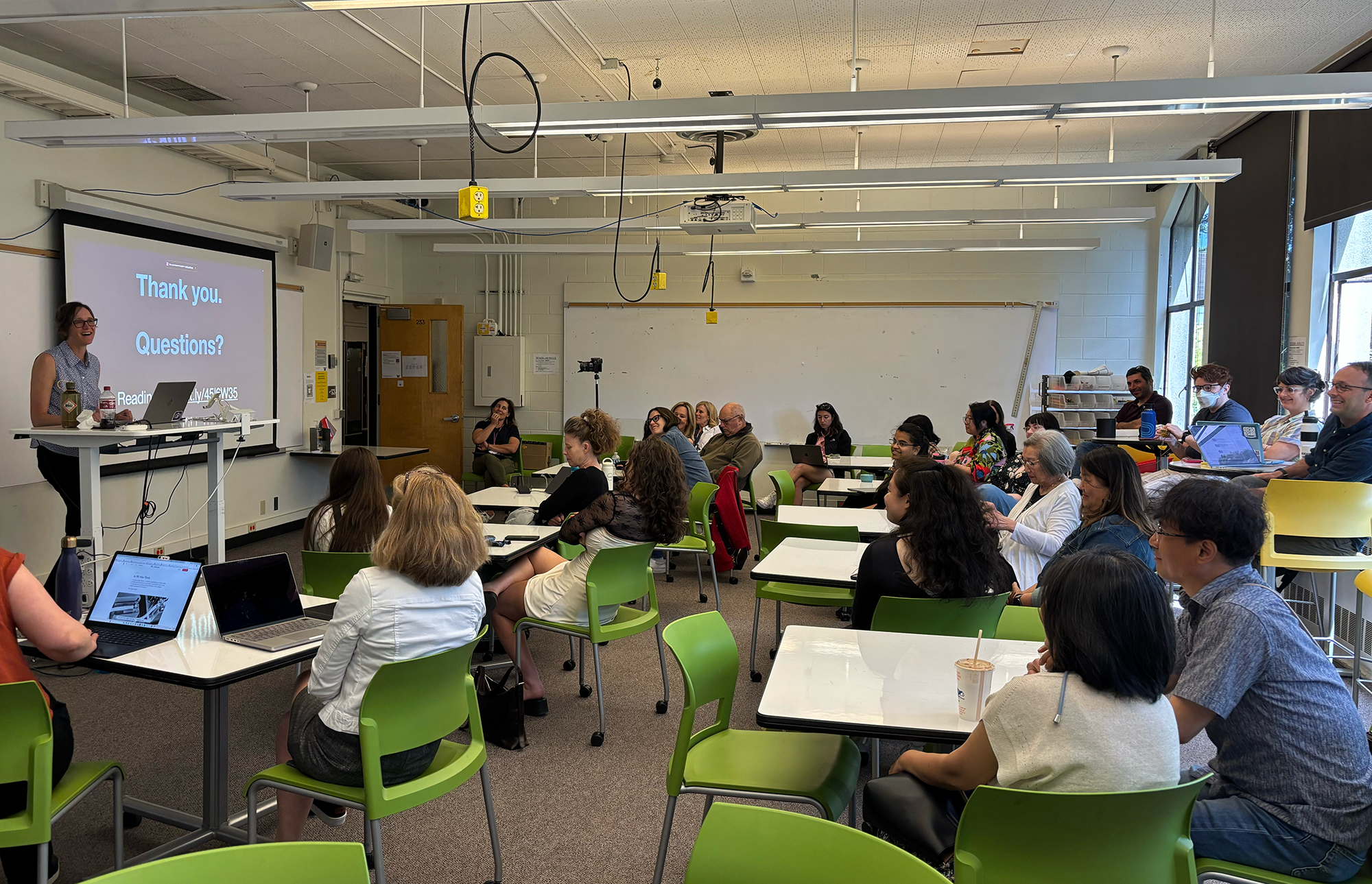 Kate Starbird presents to about 30 people in an HCDE Classroom.