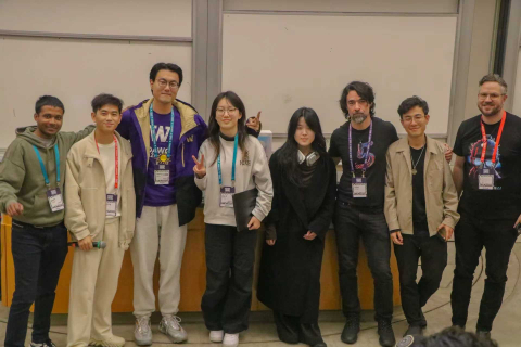 William and his teammates pose with hackathon sponsors from Meta