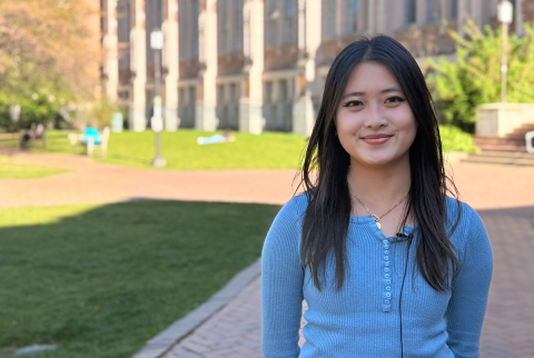 Selena Liu stands in the UW quad on a sunny day