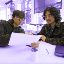 Two students work together in HCDE's design lab classroom.