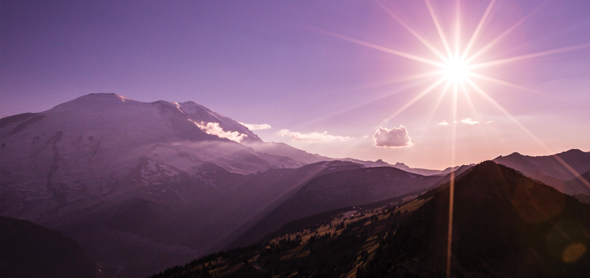 Mount Rainier from above with purple looking sky