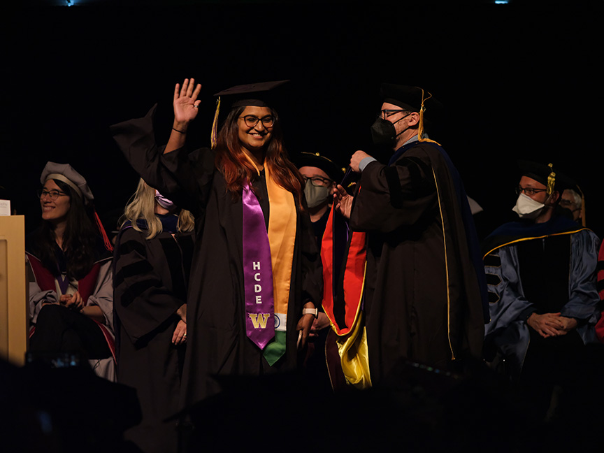 Student crossing the stage at graduation