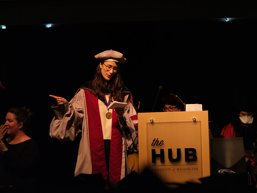 Nadya Peek reading names from the stage during the ceremony