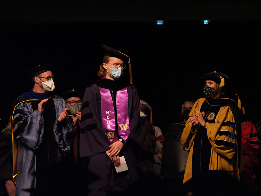 Student crossing the stage at graduation