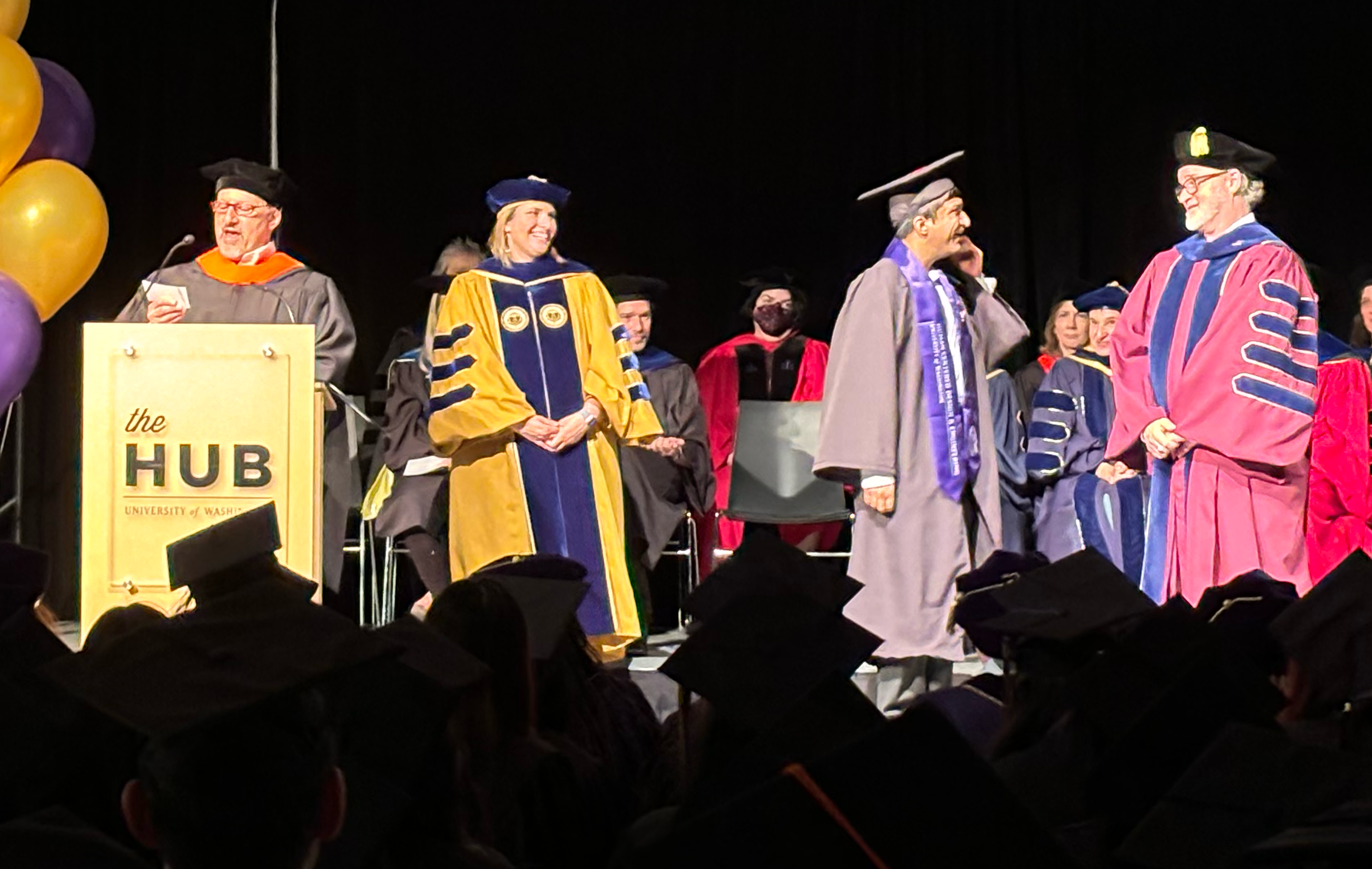 Graduates crossing the stage