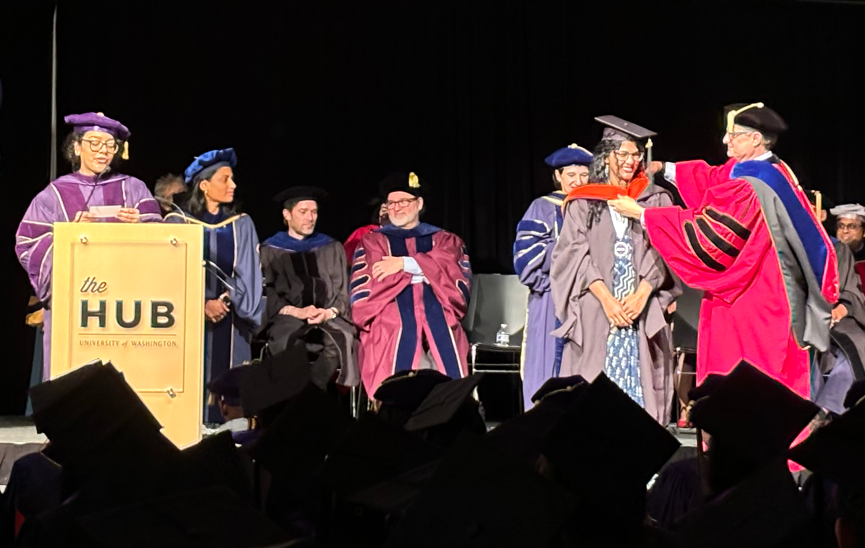 Graduates crossing the stage