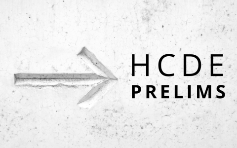 Arrow carved into a wall with the text "HCDE Prelims" next to it