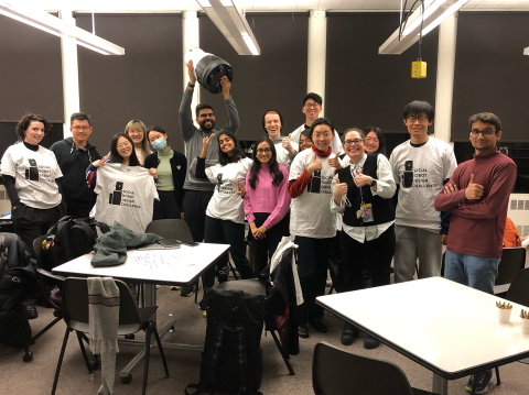 students in class posing for a group photo